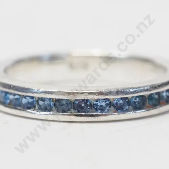 silver ring with light blue stones stamped 925