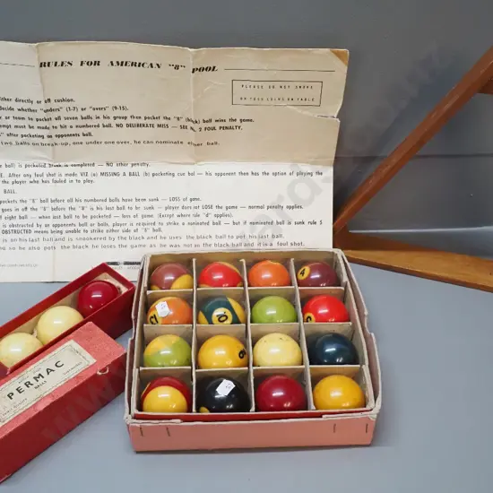 boxed vintage billiard balls with wooden triangle and an instruction sheet