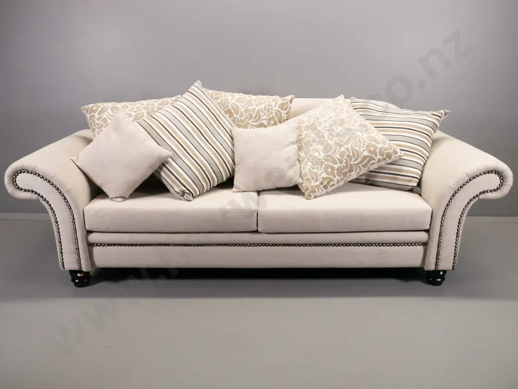 large chesterfield style rolled-arm 3-seater settee with studded detail, dark stained ball feet, contrasting pattern Image 1++