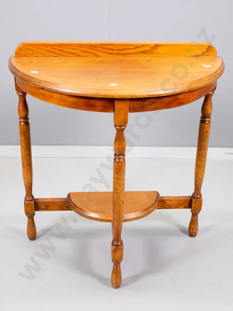 deco oak half-round occasional table with small lower shelf, turned legs - H640 W590 D290 Image 1++