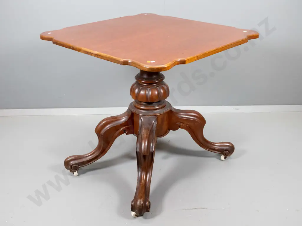 vintage mahogany supper table on non-original carved pedestal base w/claw feet on porcelain casters H725 L760 W760 Image 1++