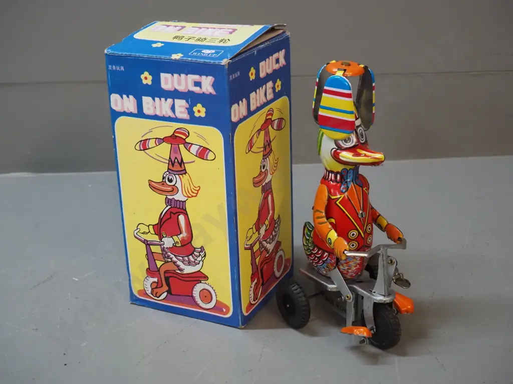 reproduction wind-up tin toy whirligig duck on tricycle - goes well H-210 Image 1++
