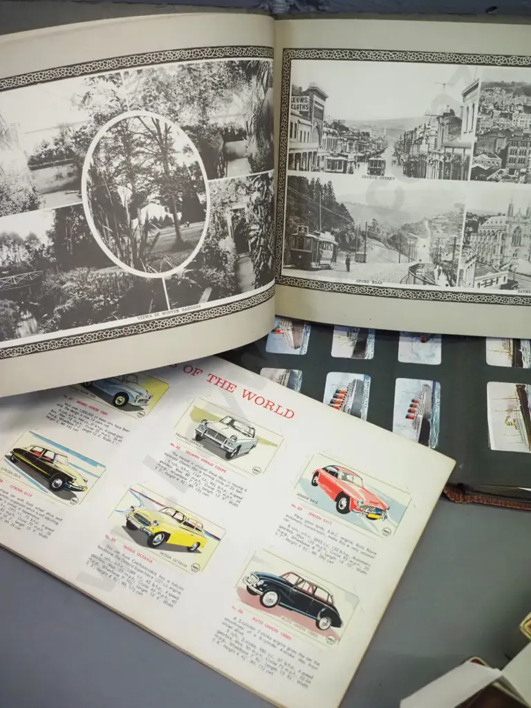 3 Castles cigarette card album, assorted loose cards in tobacco tins, Shell Cars of the World album and Dunedin Image 1++
