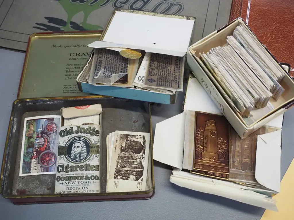 3 Castles cigarette card album, assorted loose cards in tobacco tins, Shell Cars of the World album and Dunedin Image 1++