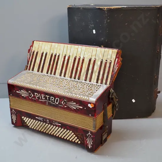 Pietro piano accordion - a few keys lifted. With case