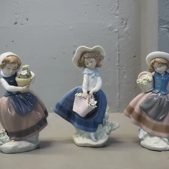 3 Lladro figurines - girls in the wind carrying flowers, tallest is H-180