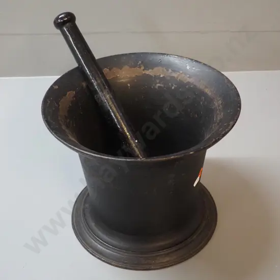 heavy cast iron mortar and pestle - some flaking paint and corrosion, stamped T&C Clark & Co No. 10. H-210 D-255 at rim