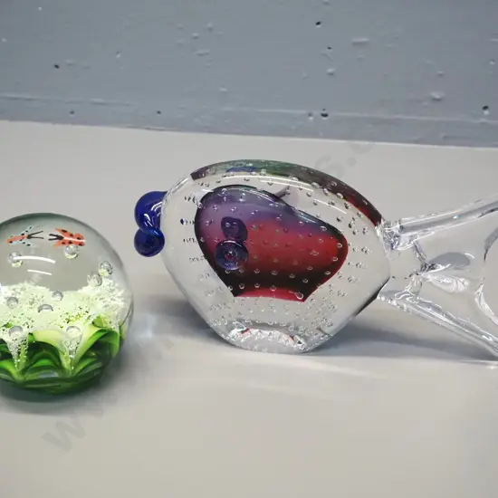 2 art glass items - fish ornament H-110 W-220 and a globe paperweight D-100