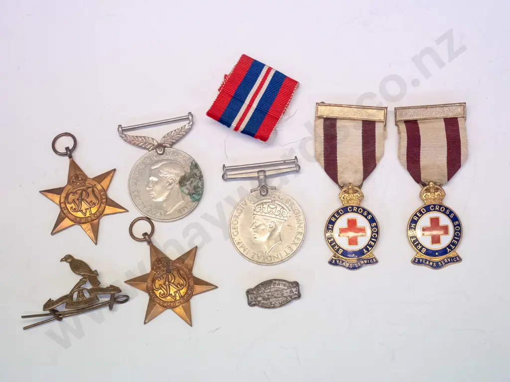 assorted medals: 2 1939-1945, 2 star medals 1939-1945, 2 Red Cross medals, 2 badges & spare ribbon Image 1++