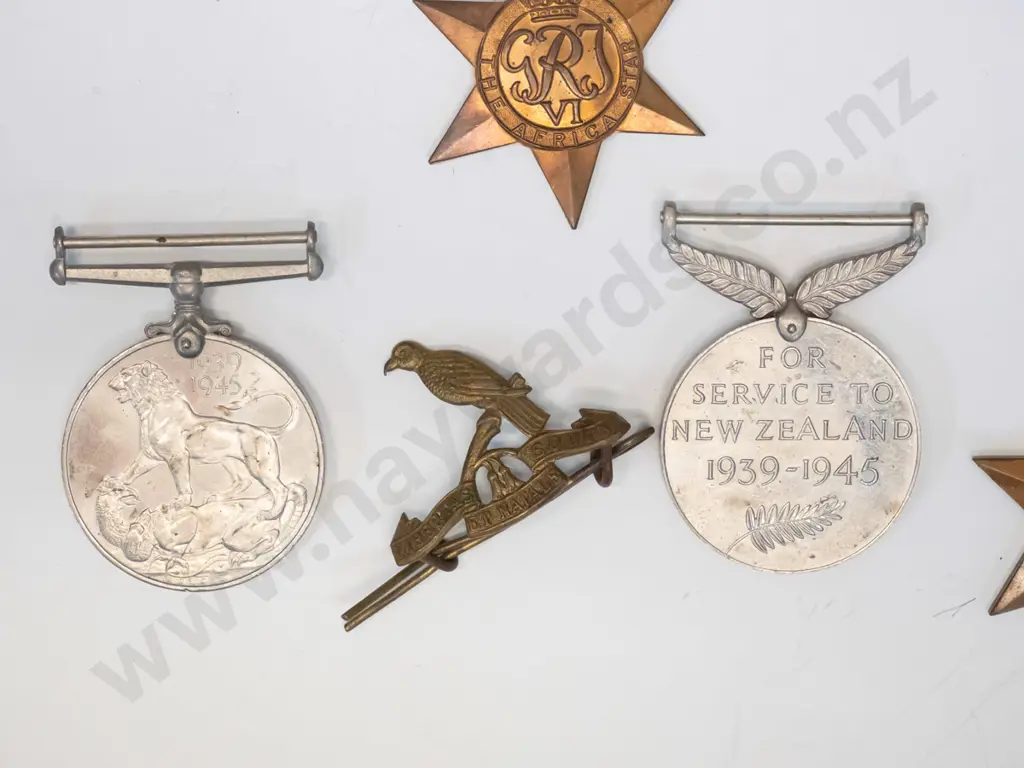 assorted medals: 2 1939-1945, 2 star medals 1939-1945, 2 Red Cross medals, 2 badges & spare ribbon Image 1++