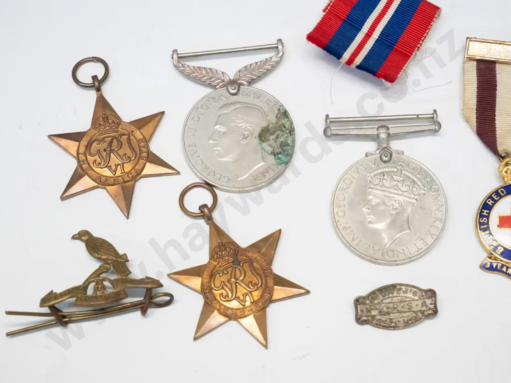 assorted medals: 2 1939-1945, 2 star medals 1939-1945, 2 Red Cross medals, 2 badges & spare ribbon Image 1++