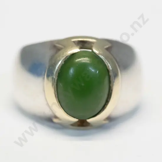 silver/gold greenstone ring stamped 14kt-stg