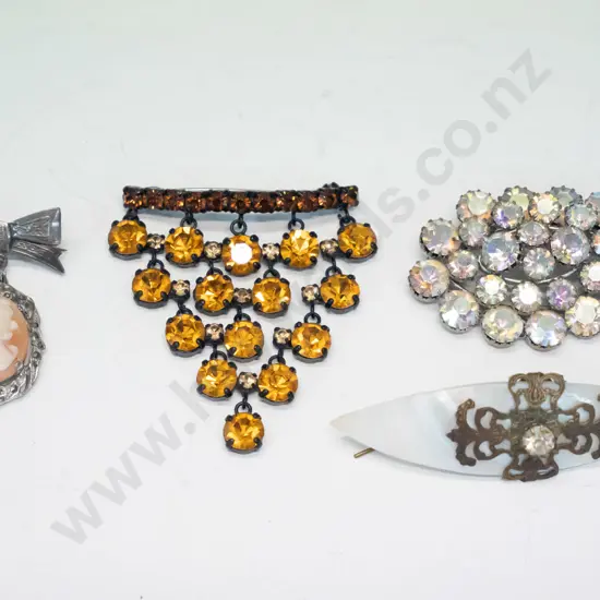 4 costume brooches