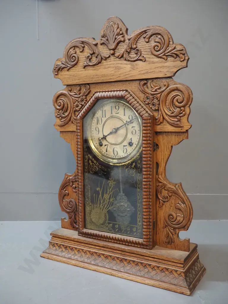 vintage mantel clock in heavily carved oak case, no maker's marks, discolouration to dial and brass bezel H585 W395 D125 Image 1++