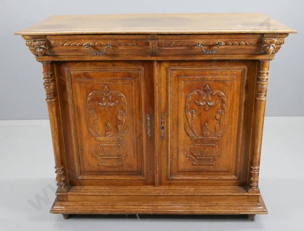 vintage French oak sideboard w/ carved detail, 2 door, 2 drawer, column front - small split to one door H1015 W1190 D540 Image 1++