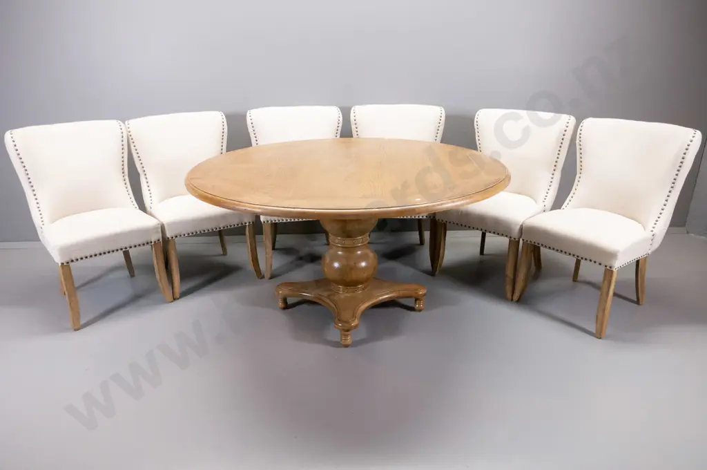 oak vintage-style round dining table with heavy pedestal base, 6 chairs with studded fabric, deep-button on backs. Image 1++