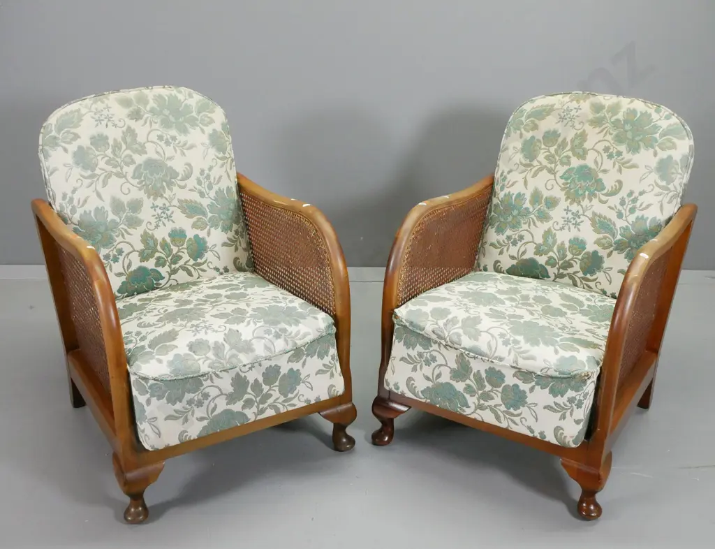 mid-century beech cab-leg lounge chairs with coil sprung seats,  floral brocade, bergere cane sides, 1 has sagging seat Image 1++