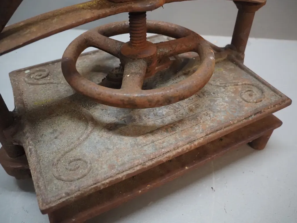 vintage small cast iron book press, maker marks for Patrick Richie Edinburgh - surface corrosion, wooden handle perished Image 1++