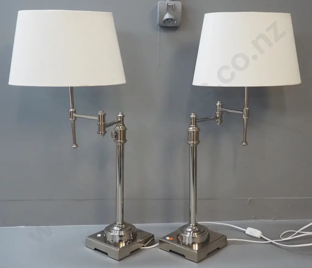 pair of tall chrome articulated swing-stem table lamps with oval shades H-780 Base 170 x 170 Image 1++