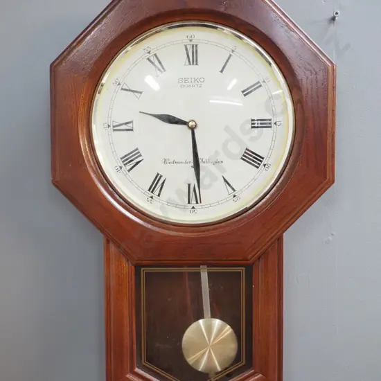 Seiko wood-cased wall clock with pendulum - quartz battery movement  - going H530 W330
