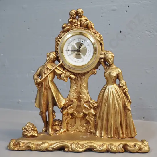 gilt finish composite or plaster mantel clock stamped Ruggeri, with Mercedes movement - chip to front H250 W240