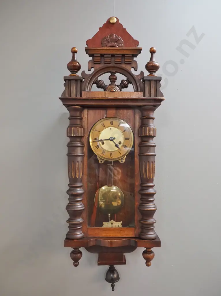 vintage pendulum wall clock in ornate carved mixed timber case w/ turned posts, finials, half ship's wheel, w/key, chip Image 1++