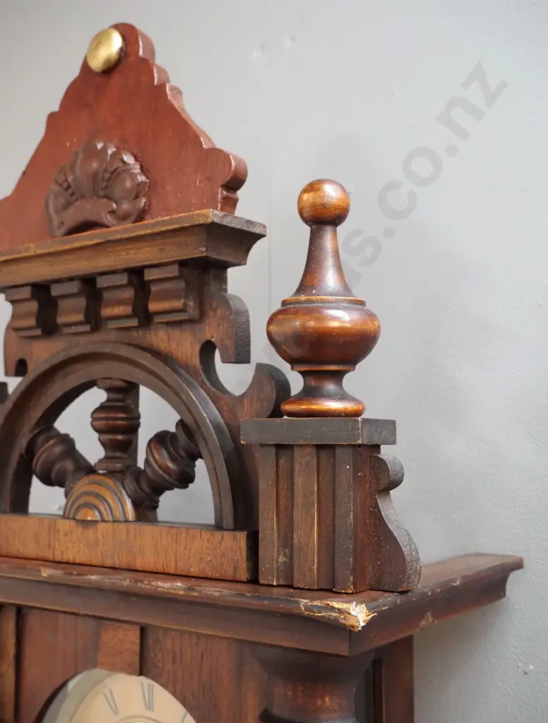 vintage pendulum wall clock in ornate carved mixed timber case w/ turned posts, finials, half ship's wheel, w/key, chip Image 1++