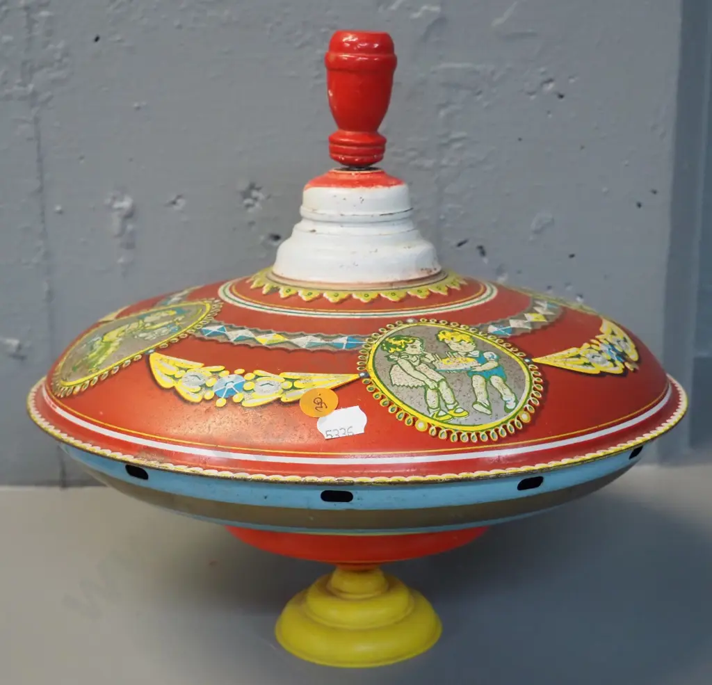 vintage child's spinning top - metal with plastic base, working but wobbly - pitting to paint H-260 D-280 Image 1++