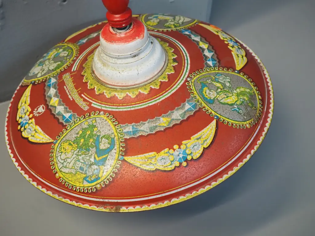 vintage child's spinning top - metal with plastic base, working but wobbly - pitting to paint H-260 D-280 Image 1++