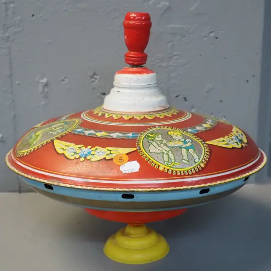 vintage child's spinning top - metal with plastic base, working but wobbly - pitting to paint H-260 D-280