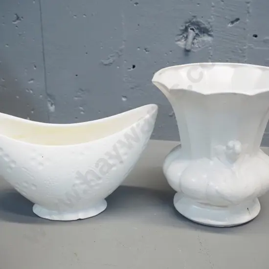 2 Crown Lynn white vases - impressed dimple pattern 663 w/small chip to base, taller urn shaped one has crazing H170