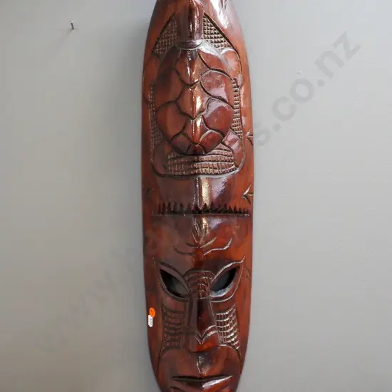 carved timber wall mask with turtle motif H680 W160