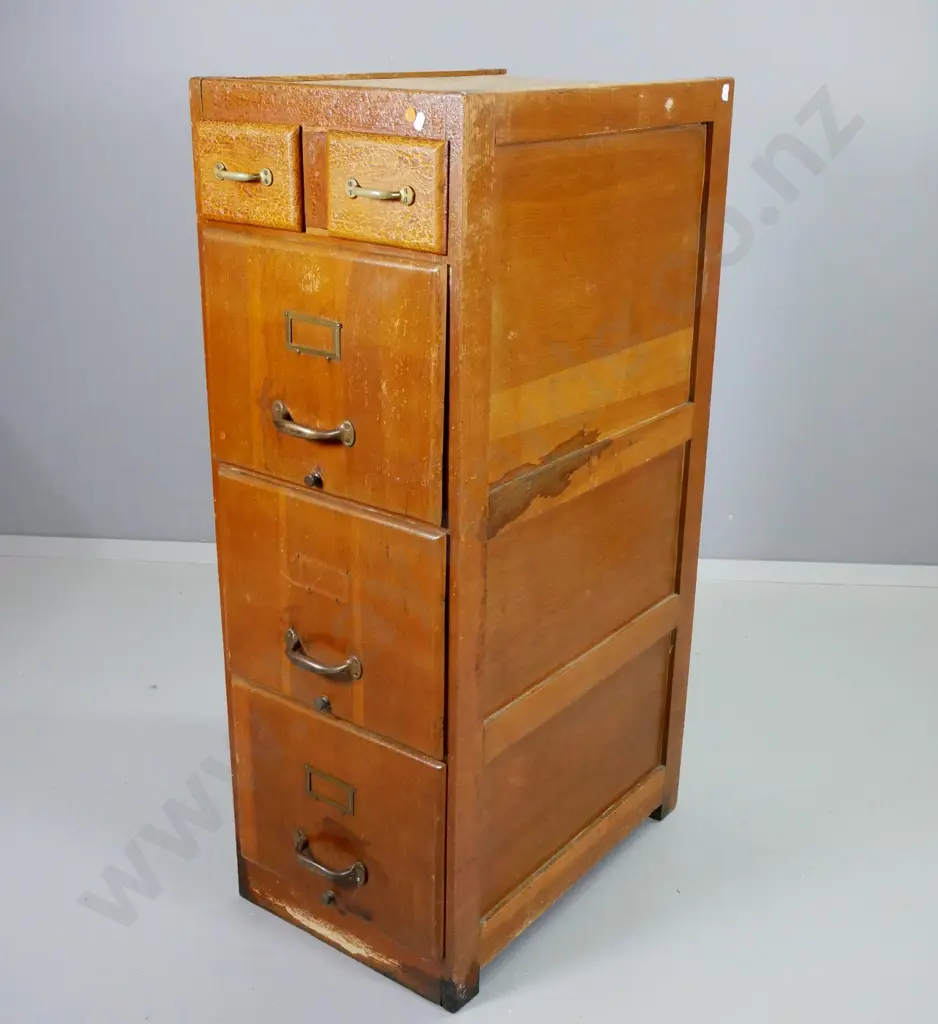 vintage oak filing cabinet with 3 file drawers, 2 small top drawers, one brass label holder has come off, polish needs Image 1++