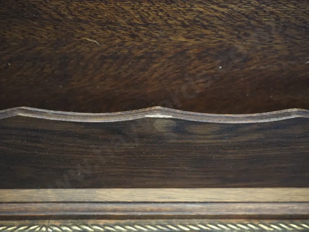 oak wall shelf with pressed brass panel, small lower shelf, and figural cast brass coat hooks H-350 W-850 D-200 Image 1++