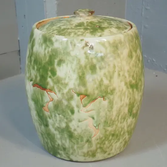 Timaru Potteries mottled green glaze lidded storage jar w.under glaze faults, chipped lid handle H310 D250