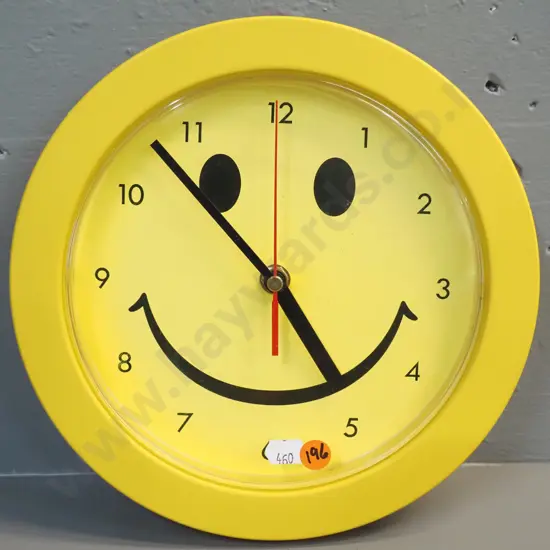 yellow plastic smiley face clock with quartz movement D-230