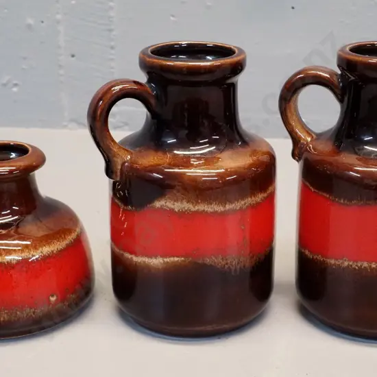 3 German pottery orange & brown  jug vases - smallest has under-glaze chip, one of taller has glaze fault/chip H-170