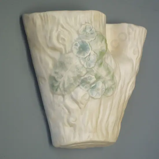 Crown Lynn wall pocket vase No 544 - log style primula pattern. Small rub to glaze. H195 W195 D80