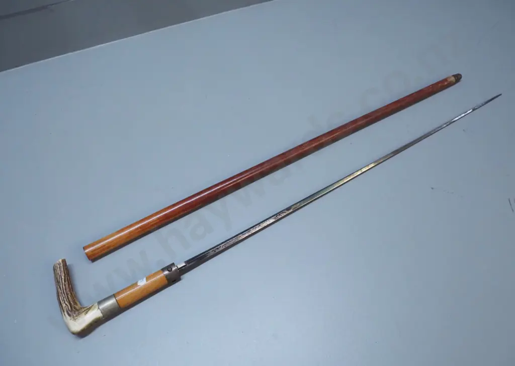walking stick with horn handle, monogrammed nickel collar, and decorated steel pull-out blade L-860 Image 1++