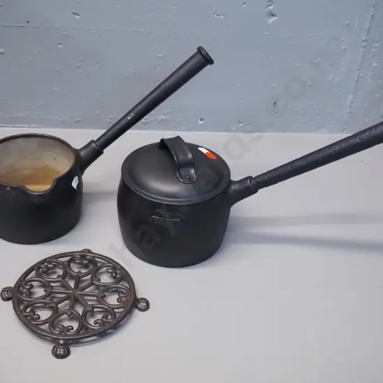 2 vintage cast iron pots and a small trivet - one pot has lid marked Kenrick No. 3 - 2 pint. Smaller Kenrich No. 2,