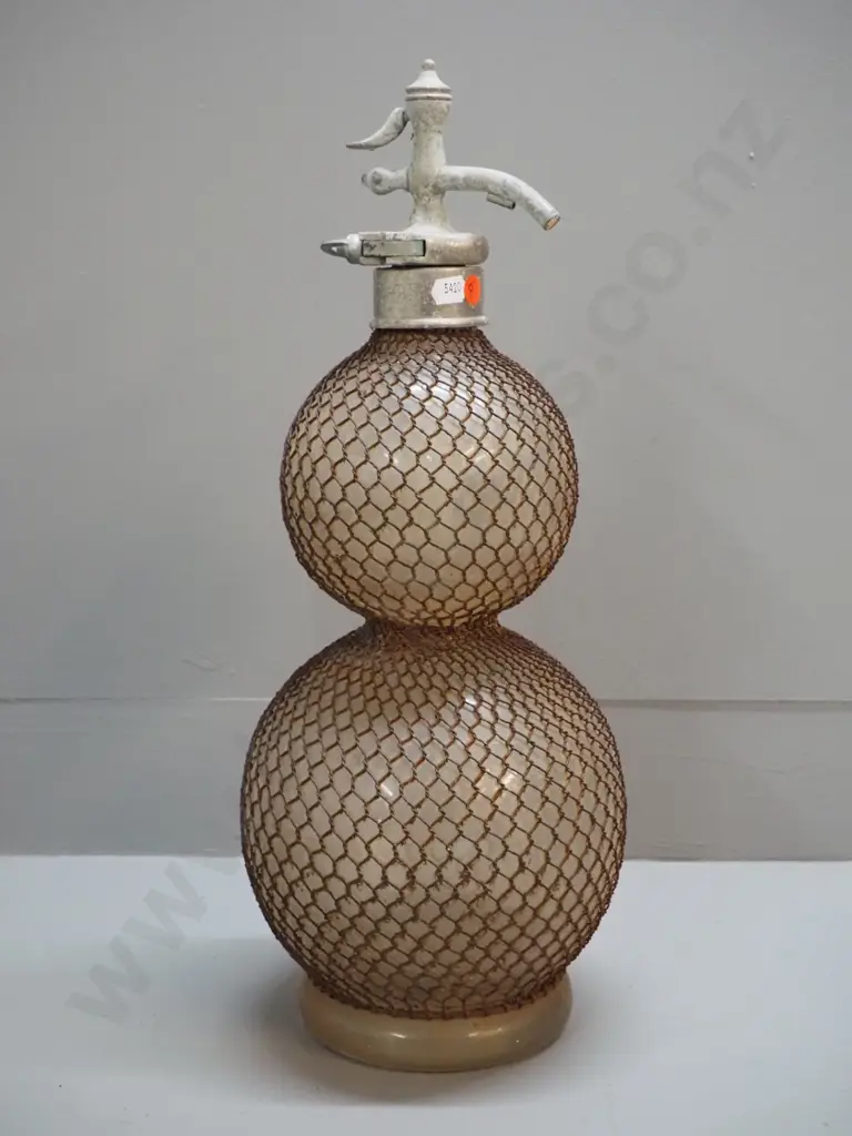 vintage double ball shape soda syphon in wire mesh - top marked British Syphon Manufacturing Co London - some pitting, Image 1++