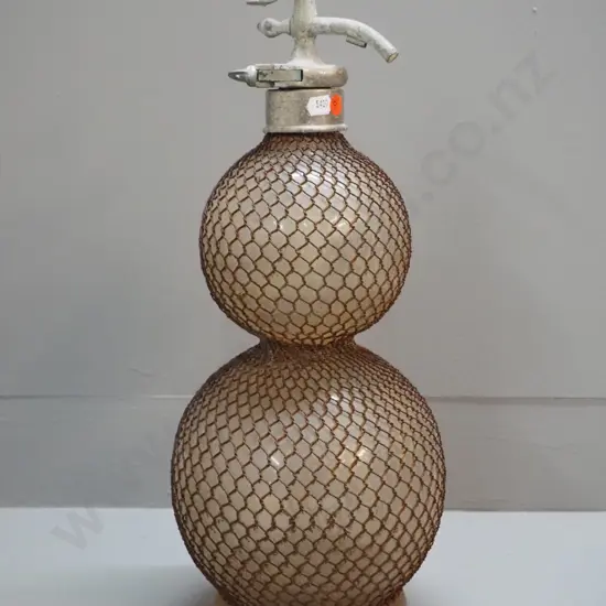 vintage double ball shape soda syphon in wire mesh - top marked British Syphon Manufacturing Co London - some pitting,