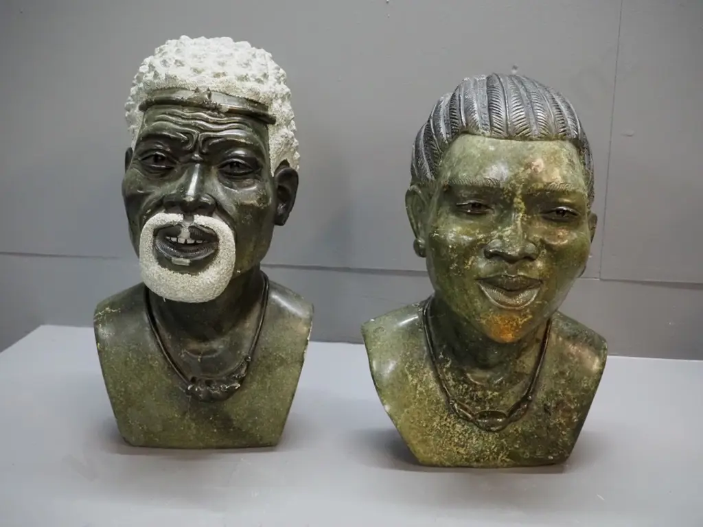 pair of carved stone busts - Nelson & Winnie Mandela, signed Farai Gatsi. Chips & scrapes, esp.to face of Nelson H-440 Image 1++