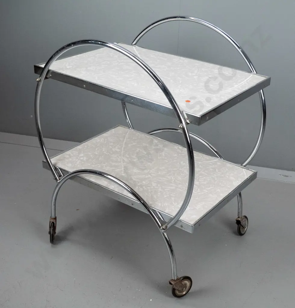 retro 2-tier formica and chrome hoop side tea trolley with metal & rubber wheels, minor pitting in spots Image 1++