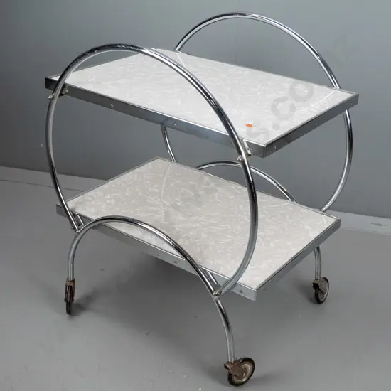 retro 2-tier formica and chrome hoop side tea trolley with metal & rubber wheels, minor pitting in spots