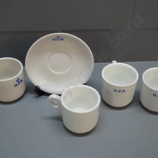 Crown Lynn NZR cup & saucer in good condition & 3 English NZR mugs marked Maddock, each with fault or repair