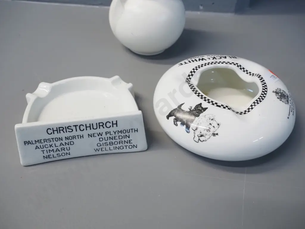 2 advertising ashtrays - Black & White Whisky by James Green and Auto Parts NZ by Royal Doulton plus a small Image 1++