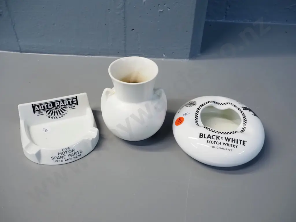 2 advertising ashtrays - Black & White Whisky by James Green and Auto Parts NZ by Royal Doulton plus a small Image 1++