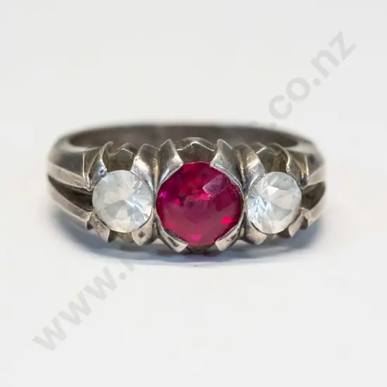 silver ring with red stone stamped 925 [needs a clean]
