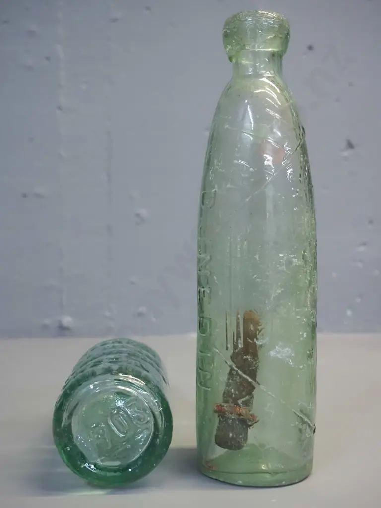 vintage Thomson & Co. Dunedin Crystal Springs minereal water marble bottle with green marble and a Thomson & Co Dunedin Image 1++
